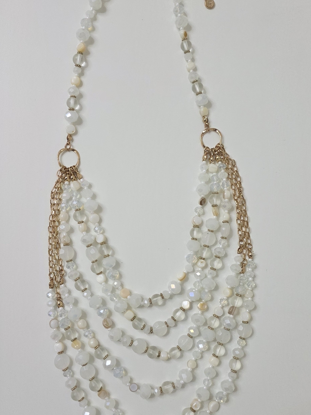Multi-Strand White Beaded Necklace with Gold Accents